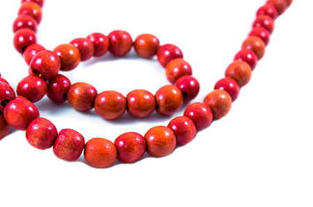 red beads on white background,decoration, pearl, jewelry, bead, bright, ornamentの写真素材