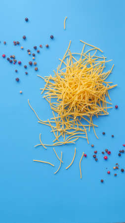 Vermicelli pasta on a blue backgroundの写真素材