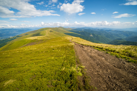 Landscape of Borzhava ridge of the Ukrainian Carpathian Mountains. Clouds above Carpathiansの写真素材