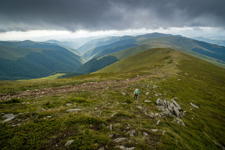 Rain clouds above Carpathians. Panorama of Borzhava Ridge of the Ukrainian Carpathian Mountainsの写真素材