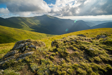 Landscape of Borzhava ridge of the Ukrainian Carpathian Mountains. Clouds above Carpathiansの写真素材