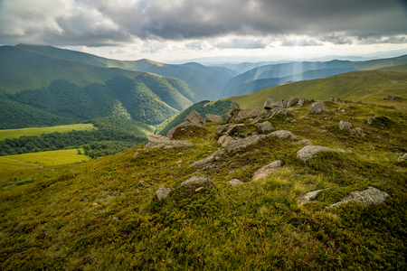 Rain clouds above Carpathians. Panorama of Borzhava ridge of the Ukrainian Carpathian Mountainsの写真素材