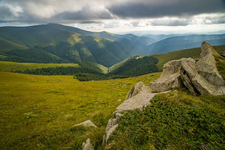 Rain clouds above Carpathians. Panorama of Borzhava ridge of the Ukrainian Carpathian Mountainsの写真素材