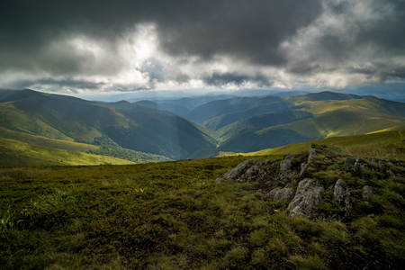 Rain clouds above Carpathians. Panorama of Borzhava ridge of the Ukrainian Carpathian Mountainsの写真素材