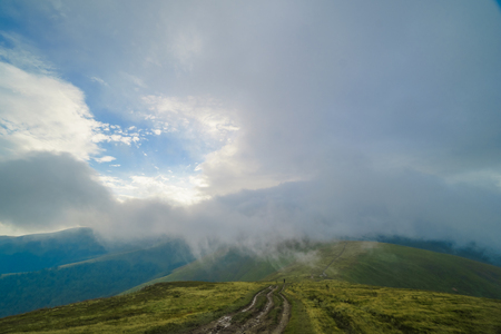 Rain clouds above Carpathians. Panorama of Borzhava ridge of the Ukrainian Carpathian Mountainsの写真素材