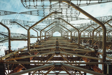 Duga - Soviet over-the-horizon OTH radar system. Duga-3 Russian Woodpecker - antenna complex, military object of USSR ABM. Chernobyl Exclusion Zone, Pripyat, Ukraineの写真素材