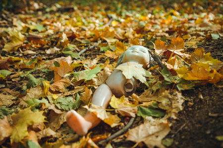 Old doll in Chornobyl exclusion zone. Radioactive zone in Pripyat city - abandoned ghost town. Chernobyl history of catastrophe. Lost place in Ukraineの写真素材