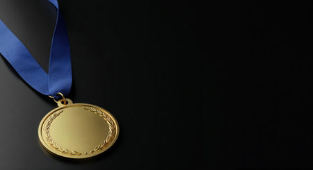 A gleaming golden award with a blue fabric ribbon lies on a sleek black background, symbolizing success and achievement with generous room for custom text.の素材