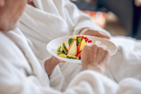Nice breakfast with fresh fruits in a hotelの写真素材