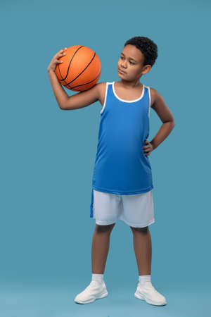 African american boy in sportswear with basketball ballの写真素材