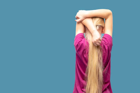 Girl doing warmup with back to cameraの写真素材