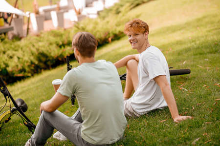 Two bike riders resting after their workoutの写真素材