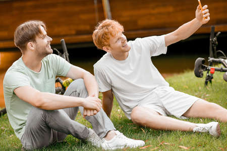 Two cheerful friends enjoying their photo shootの写真素材