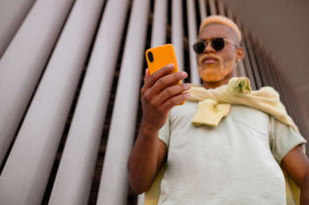A bearded extravagant young man in sunglassesの写真素材