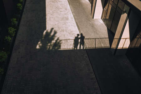 Top view of an offcie district and one man standing near the wallの写真素材