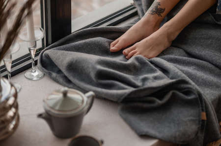 Close up picture of female feet with tatooの写真素材