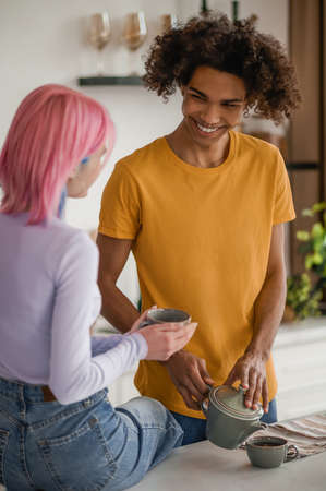 Happy young couple in the kitchenの写真素材