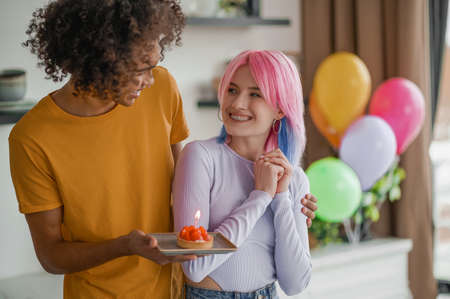Young cute couple celebrating valentines dayの写真素材