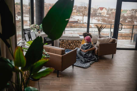 Two young people feeling comfortable and peaceful togetherの写真素材