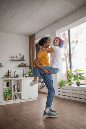 Young couple having a good time at homeの写真素材