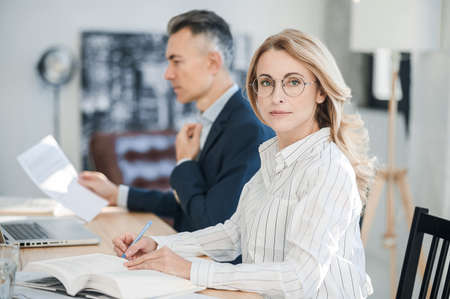 Man and woman working together in the offcieの写真素材