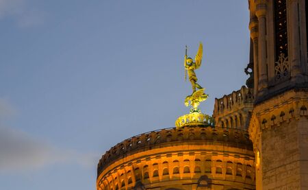 Statue of angel at night in Lyon, Franceの写真素材