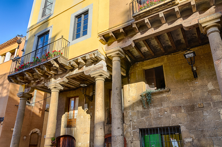 Amazing combination of ancient and modern building decoration in Tarragona, summer Spainの写真素材