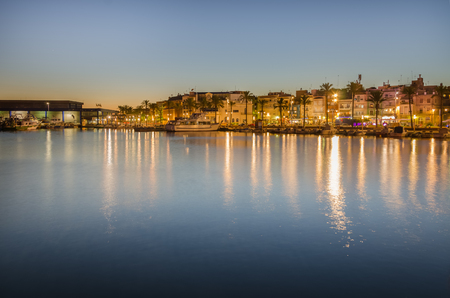 Quay of port in Tarragona in sunset light, summer Spainの写真素材