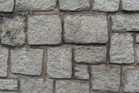 Texture of the granite stone wall for backgroundの写真素材