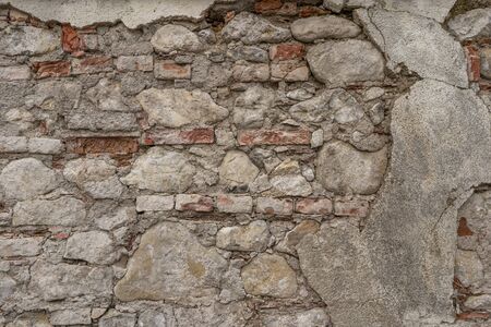 The texture of the old masonry. Old wall as backgroundの写真素材