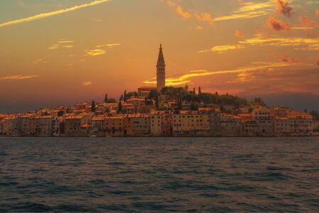 Colorful sunrise over Rovinj old town, Istria, Croatiaの写真素材