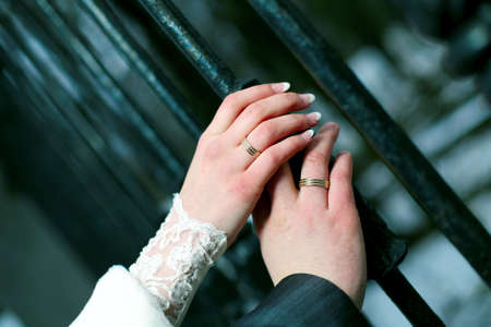 hands warm loving each other in this cold season of autumn の写真素材