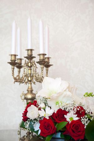 On the table is a candlestick, in the foreground colorsの写真素材