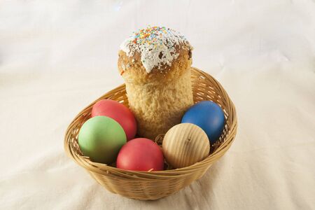 Easter eggs and Easter set in a basket on a white backgroundの写真素材