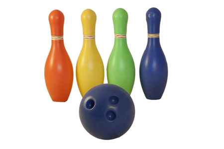 Children's set to play bowling. Ball and colored pins.の写真素材