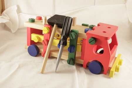 Toy car designer and tools, a hammer for childrenの写真素材