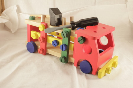 Toy car designer and tools, a hammer for childrenの写真素材
