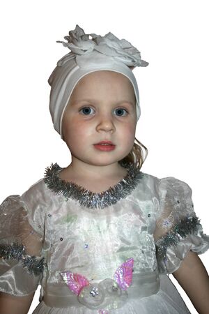 A little girl in a festive New Years dress.の写真素材