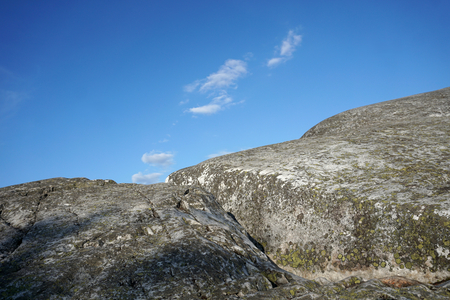 Grey stone and blue sky, national park Koli, Finlandの写真素材