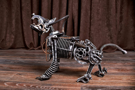 old mechanical dog robot on a brown backgroundの写真素材