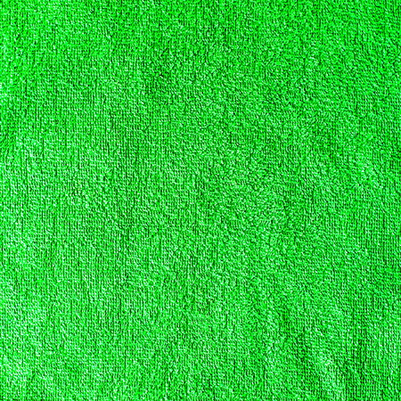 Poisonous green background with black shadows of terry material, uneven, with shadowsのeditorial素材