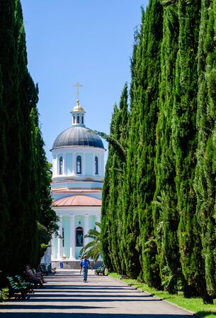 Sochi, Russia - July 20, 2019: Cypress Alley in the Cathedral of St. Michael the Archangel. Vertical...