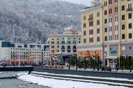 Sochi, Russia - December 29, 2018: Rosa Khutor. Mountain alpine village in winter. Mountain riverのeditorial素材