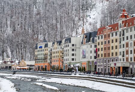 Sochi, Russia - December 29, 2018: Beautiful buildings near the winter river in a mountain alpine villageのeditorial素材