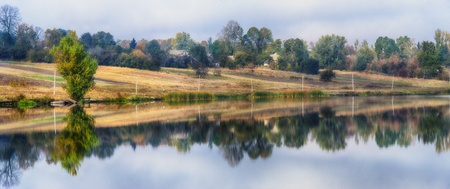 reflection. picturesque reflection of trees in the river. symmetryの写真素材