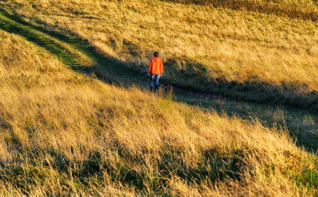 autumn morning. dawn in the Carpathian mountains. photographer, taking off the dawn. man in the mountainsの写真素材