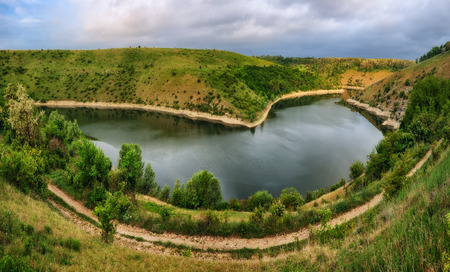 picturesque dawn by the river canyonの写真素材