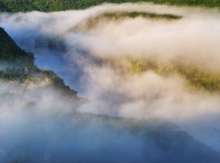 fog in the canyon of the river. scenic morning fogの写真素材
