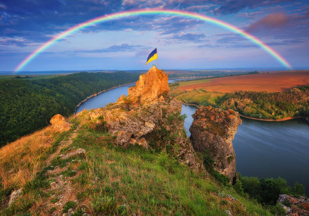colorful rainbow over the river canyon. spring morningの写真素材