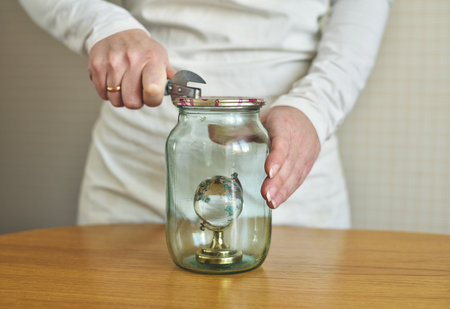 small globe in a glass jarの写真素材